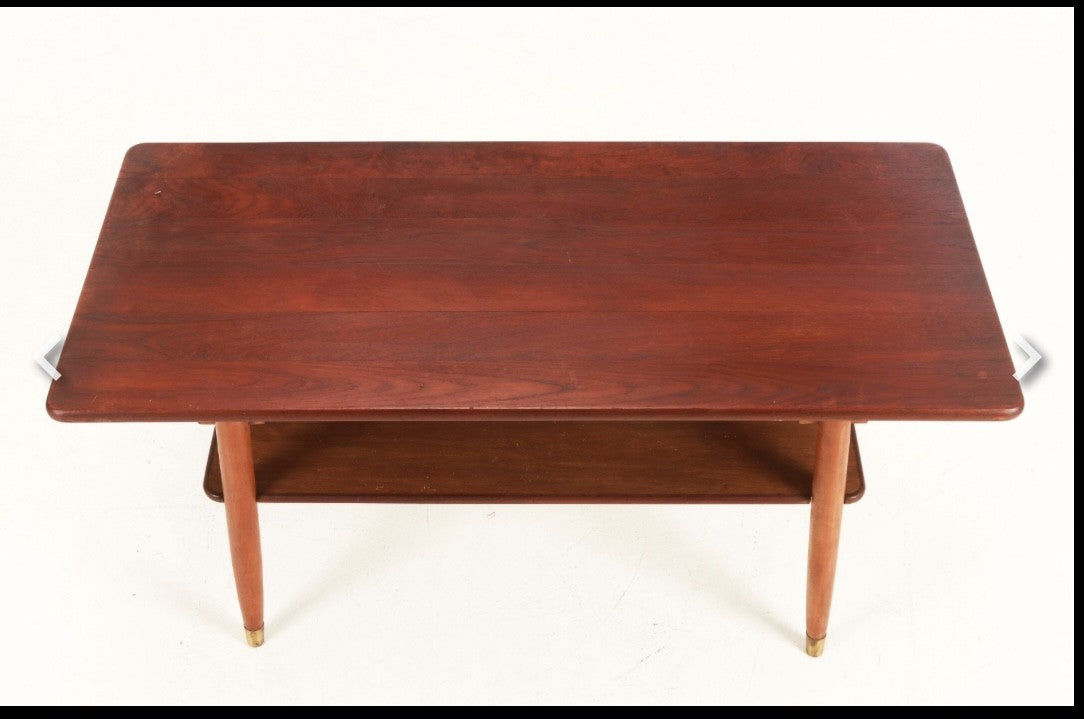 Beautiful coffee table from the 1950s-60s, with solid teak top and frame in beech and brass shoes - no. 0910