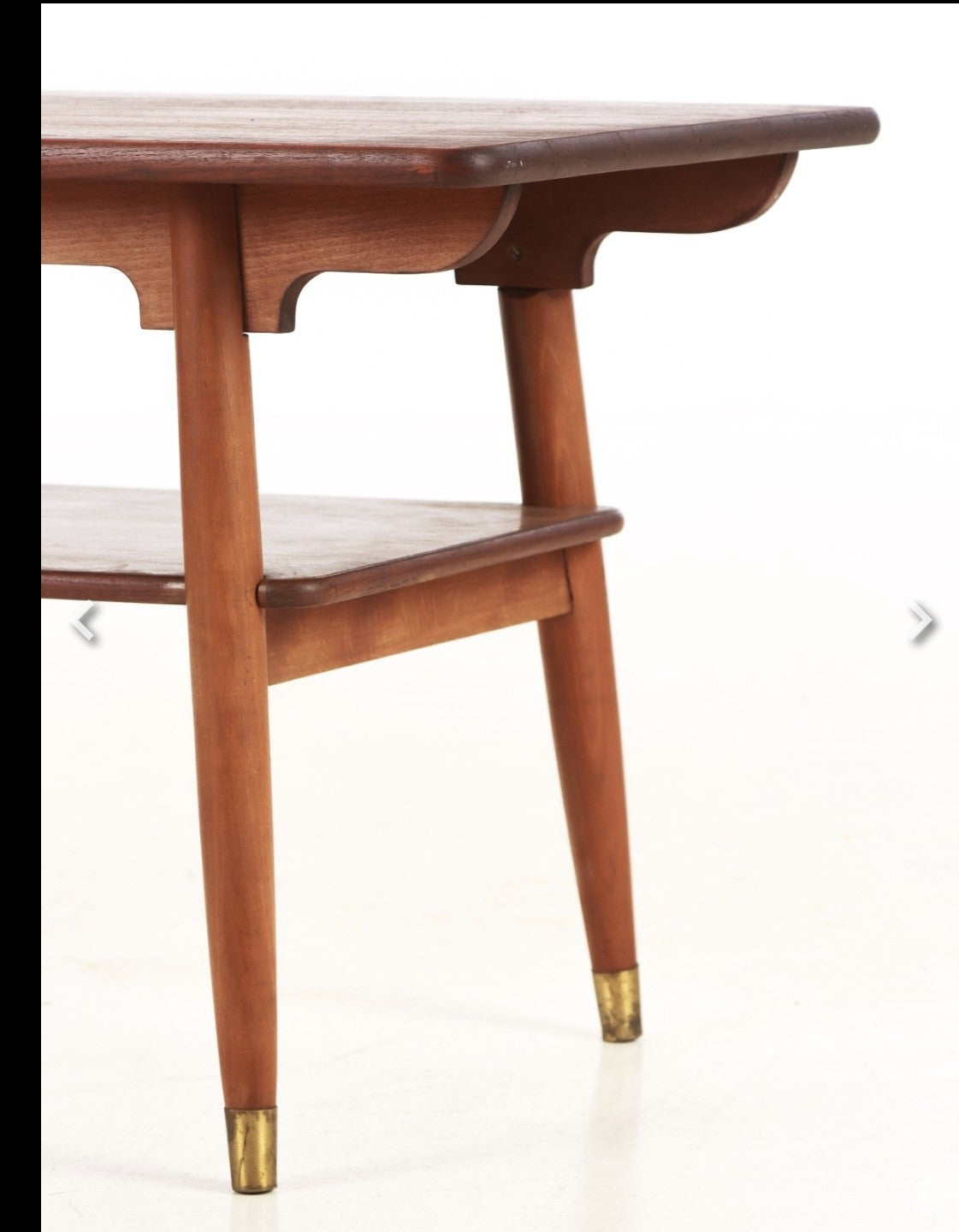 Beautiful coffee table from the 1950s-60s, with solid teak top and frame in beech and brass shoes - no. 0910