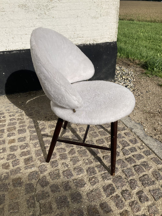 Nice upholstered chair with brass distance pieces at the seat and back - no. 0470